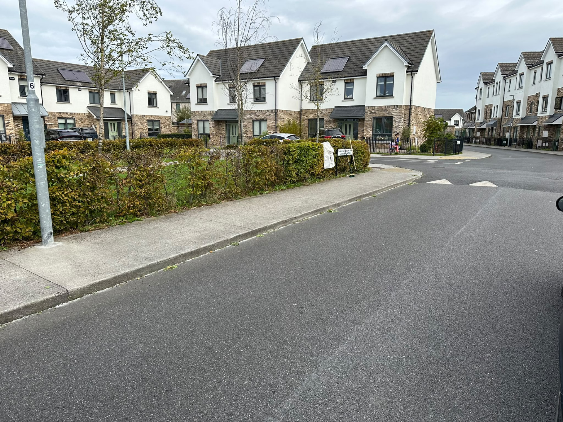 Tidy footpaths and hedges along the green
