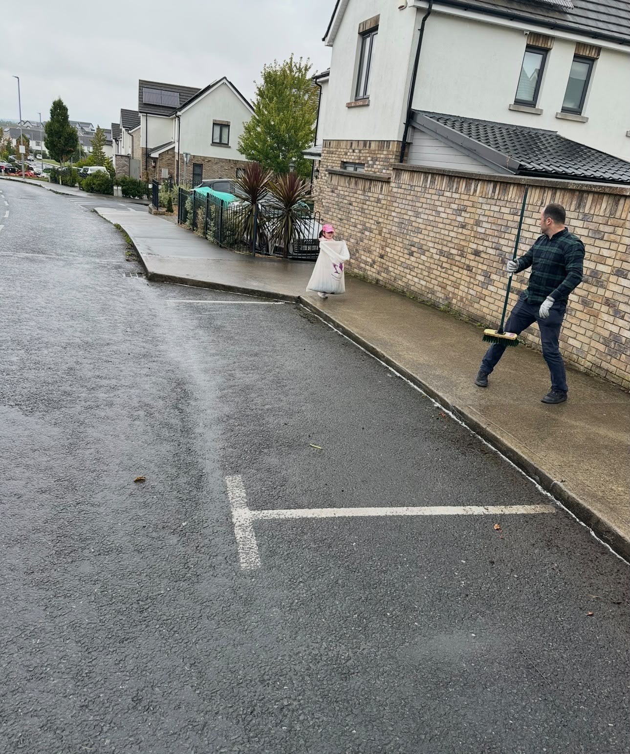 Young helpers bagging up litter