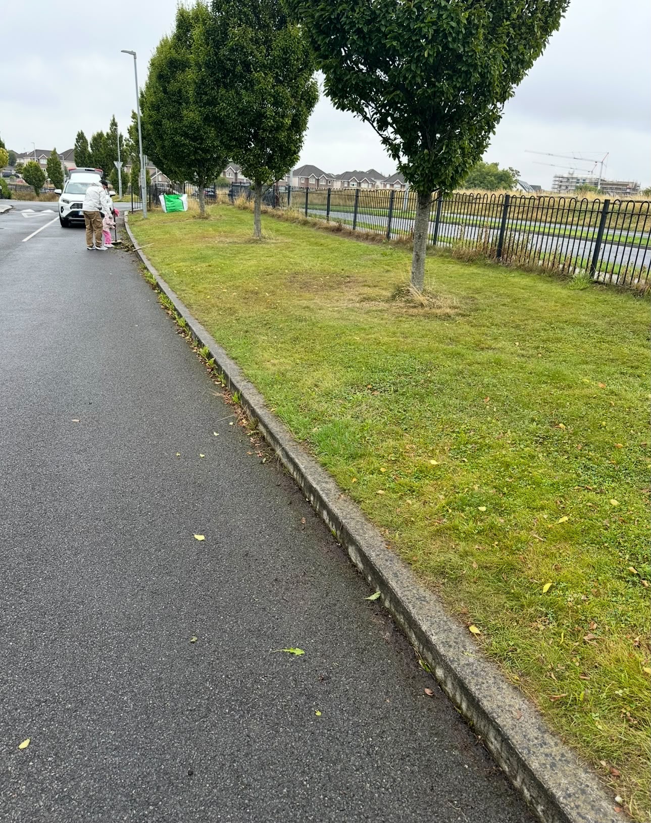 Working along the green by the gate